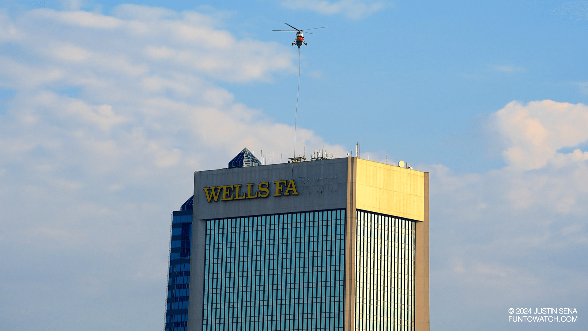 wells fargo building sign coming down