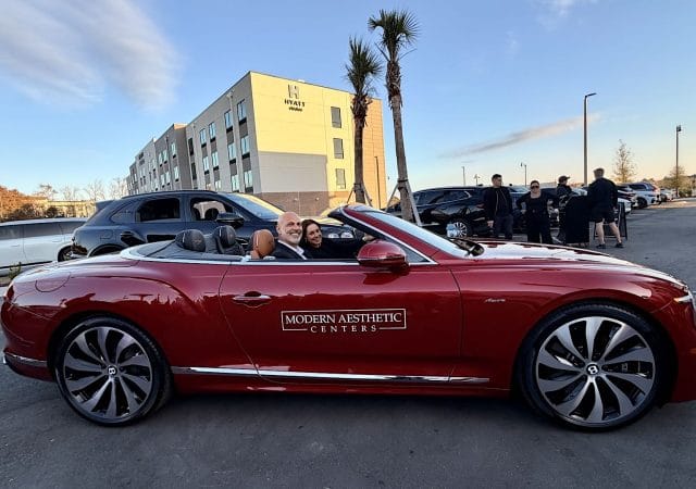 paul hassan in bentley car at modern aesthetic centers grand opening in village crossing center jacksonville fl