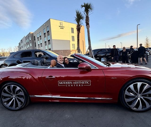 paul hassan in bentley car at modern aesthetic centers grand opening in village crossing center jacksonville fl